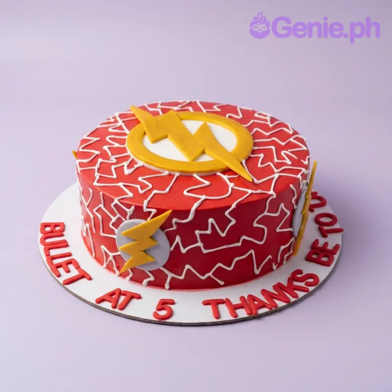 A red and yellow 1-tier cake themed around The Flash, featuring a large yellow lightning bolt logo and white lightning bolt patterns. A red and yellow 1-tier cake themed around The Flash, featuring a large yellow lightning bolt logo and white lightning bolt patterns.