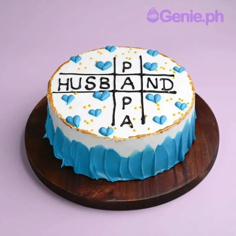 White 1-tier cake with blue palette knife side texture and tic-tac-toe board design with Husband and Papa text White 1-tier cake with blue palette knife side texture and tic-tac-toe board design with Husband and Papa text