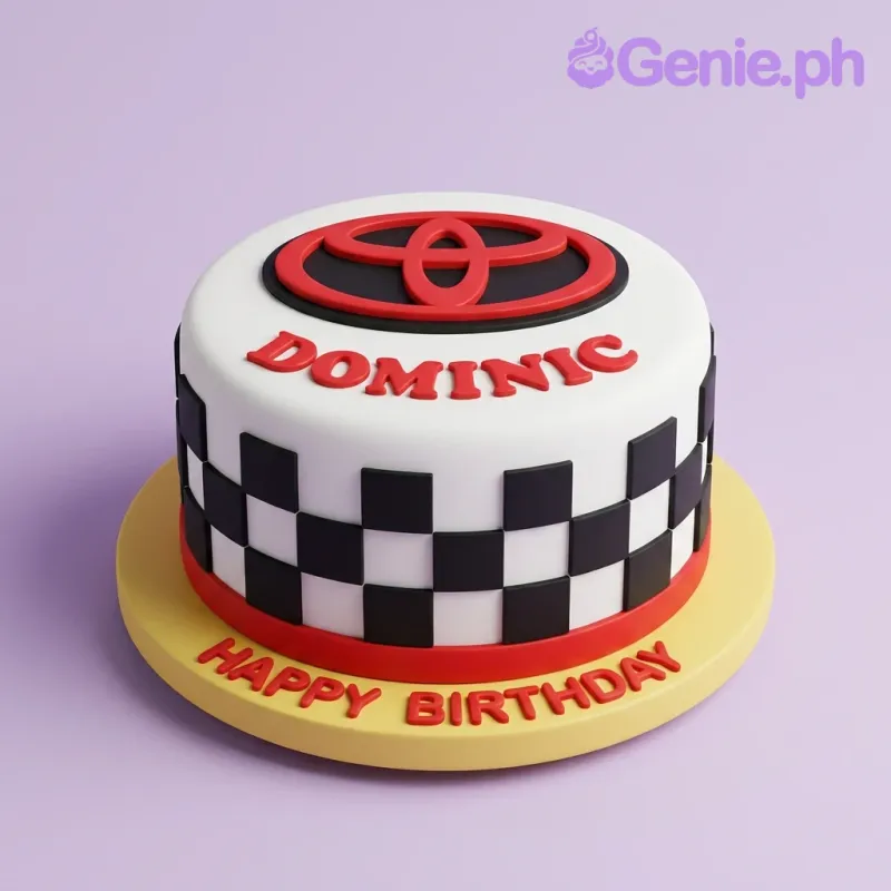 A white Fondant cake, Toyota theme, with a red Toyota logo, 'DOMINIC' text, and a checkered side pattern. A white Fondant cake, Toyota theme, with a red Toyota logo, 'DOMINIC' text, and a checkered side pattern.