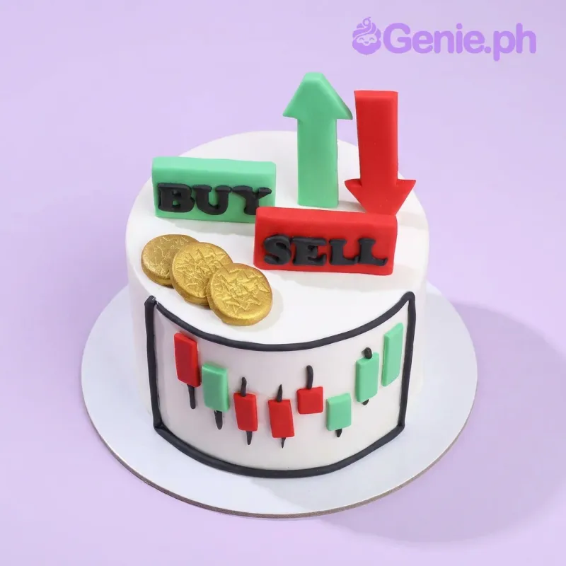 Trading cake design — 1 layer soft icing cake in white — with green up arrow and red down arrow, buy and sell rectangular signs, gold coins, and hand-piped candlestick chart on cake side Trading cake design — 1 layer soft icing cake in white — with green up arrow and red down arrow, buy and sell rectangular signs, gold coins, and hand-piped candlestick chart on cake side