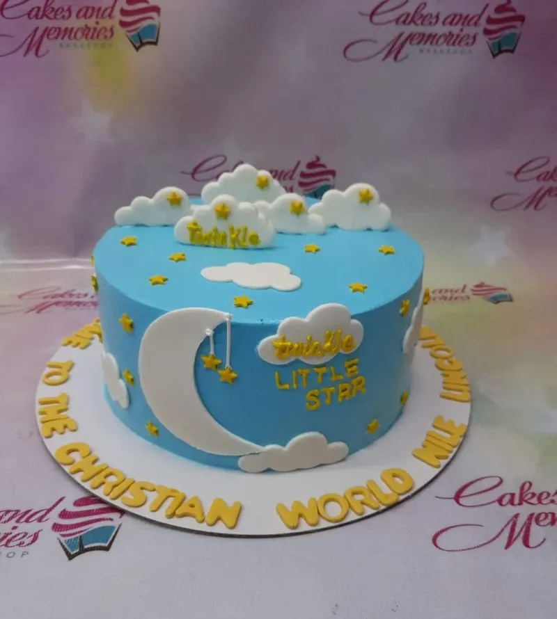 Light blue Twinkle Twinkle Little Star themed cake with white fondant clouds, yellow stars, and a large white crescent moon. Light blue Twinkle Twinkle Little Star themed cake with white fondant clouds, yellow stars, and a large white crescent moon.