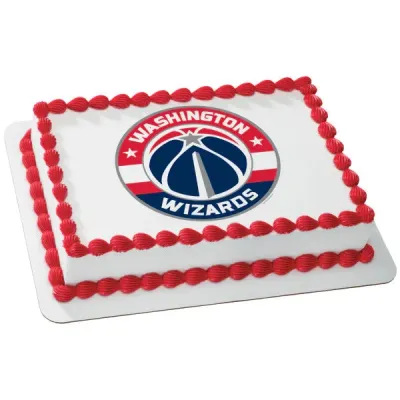A white and red rectangle sheet cake themed around Washington Wizards, featuring a Washington Wizards NBA logo printout and red icing shell borders. A white and red rectangle sheet cake themed around Washington Wizards, featuring a Washington Wizards NBA logo printout and red icing shell borders.