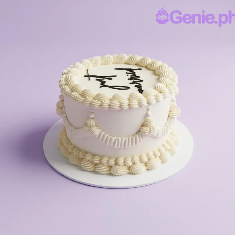One tier white soft iced wedding cake with a Just Married script topper and piped borders One tier white soft iced wedding cake with a Just Married script topper and piped borders