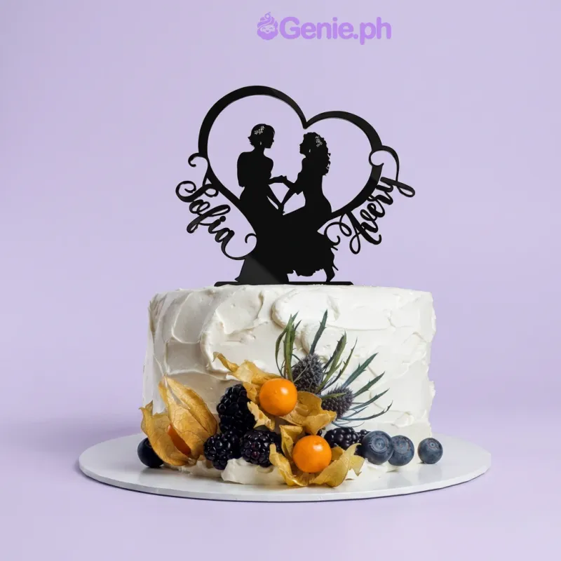 White 1-tier cake with black couple silhouette topper and fresh fruit garnish White 1-tier cake with black couple silhouette topper and fresh fruit garnish
