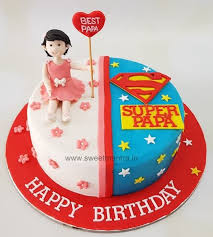 A photo of a Super Papa themed cake. It is a white and red 1 Tier cake decorated with an edible 3D girl figurine, a heart topper with 'BEST PAPA', a Superman logo, 'SUPER PAPA' text, pink flowers, and yellow and white stars.