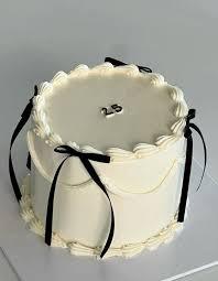 25th cream 1 Tier - colorful theme with number 25 and piped shell border top