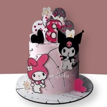 Pink Sanrio themed cake featuring My Melody and Kuromi printouts with a pink number 8 topper and heart accents.