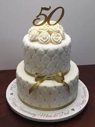 Anniversary 2 Tier Fondant - gold, white, rose theme with gold 50 topper and small white roses