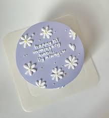 anniversary floral Bento - yellow, white theme with group of piped white daisies with yellow centers