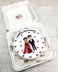 Anniversary red Bento - red theme with edible photo of a couple and small red icing hearts