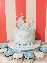 Baby Christening 1 Tier Fondant - blue, white theme with Sleeping baby on a blue crescent moon and White fondant stars on ...