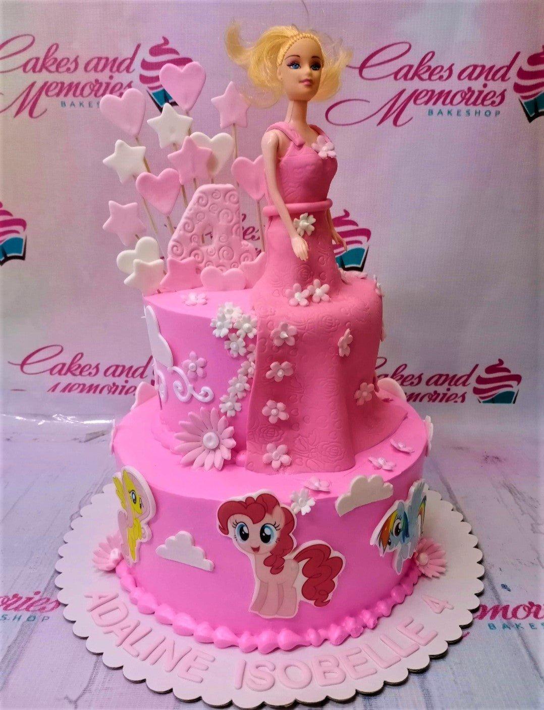 Pink 2-tier My Little Pony and Barbie themed birthday cake with fondant stars, hearts, and a large number 4 topper.