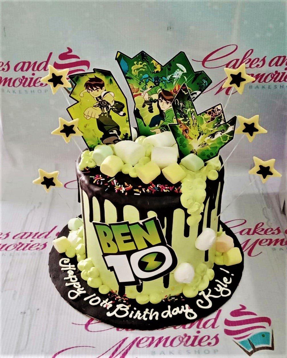 Ben 10 themed birthday cake with light green icing, chocolate drip, marshmallows, and character printouts.