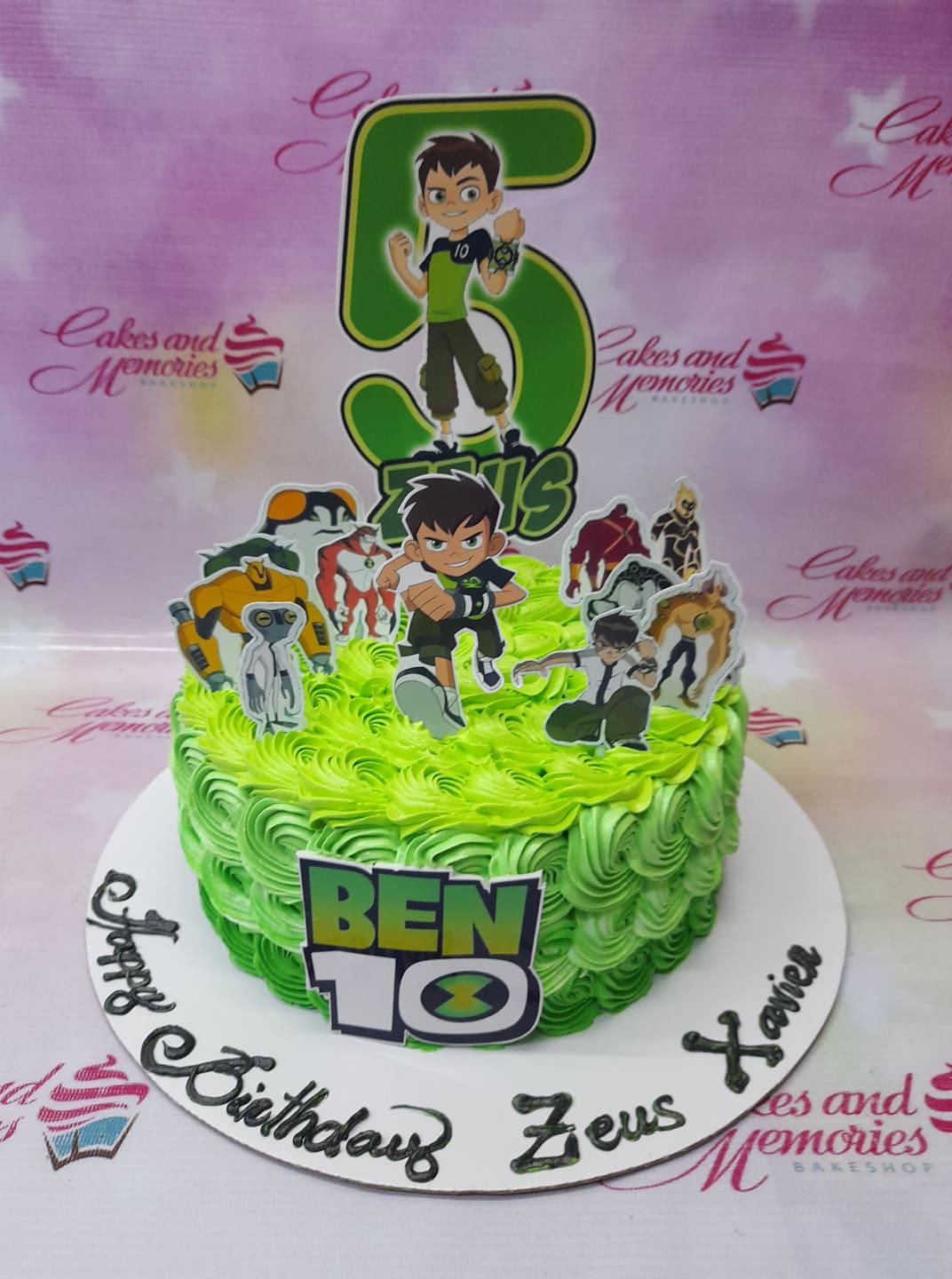 Ben 10 themed birthday cake with green icing rosettes and character printouts