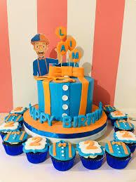 Blippi blue orange 1 Tier Fondant - orange, white theme with printout of Blippi character and large orange gumpaste bow