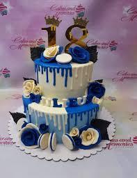 Blue and White 18th Birthday 2 Tier - blue, white, gold theme with Gold number 18 with crowns and Blue gumpaste roses