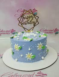 Blue birthday 1 Tier - red, white theme with Happy Birthday geometric topper and group of assorted edible flowers and leaves