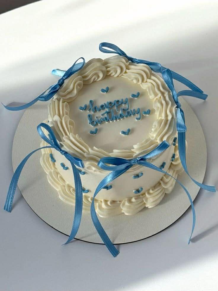 blue ribbon minimalist 1 Tier - white, blue theme with piped blue hearts on top and side