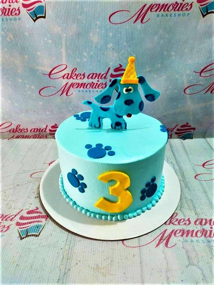 Light blue Blue's Clues themed birthday cake with a 3D fondant Blue character topper and yellow number three.