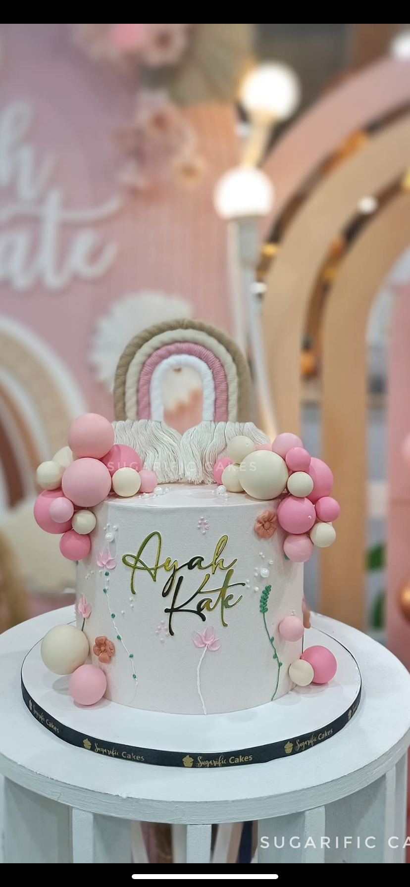 Boho Rainbow 1 Tier - red, cream, pink theme with Boho rainbow topper and Pink and cream plastic balls