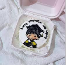 boy graduation Bento - colorful theme with boy in graduation cap and gown