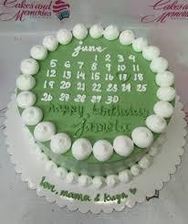calendar 1 Tier - green, white theme with calendar grid design and white icing dollops