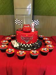 Cars Lightning McQueen 1 Tier Fondant - light, red, yellow theme with Lightning McQueen car and Checkered pattern wrap aro...
