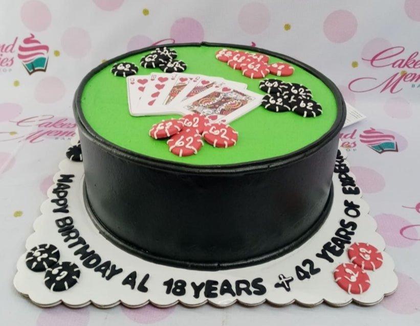 Black and green casino themed birthday cake with playing cards and poker chips for Al's 60th birthday.