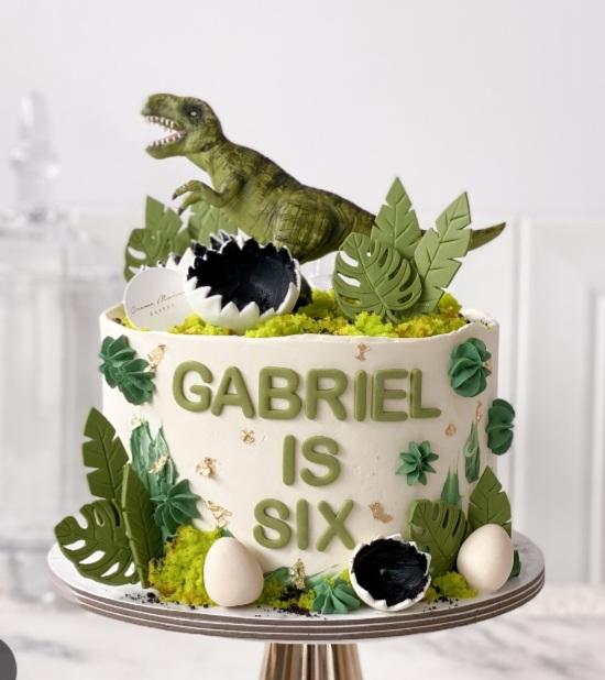Dinosaur 1 Tier - white, green, gold theme with T-Rex dinosaur and tropical monstera and palm leaves