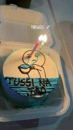 Bento cake with a hand-drawn crying stick figure and the Hindi message Tussi Na Jao on a blue and white base.