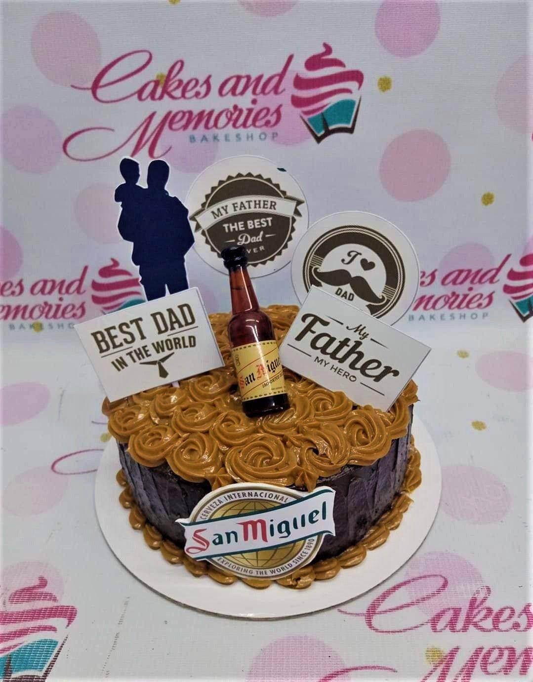 Chocolate cake with caramel icing rosettes and San Miguel beer theme for Father's Day