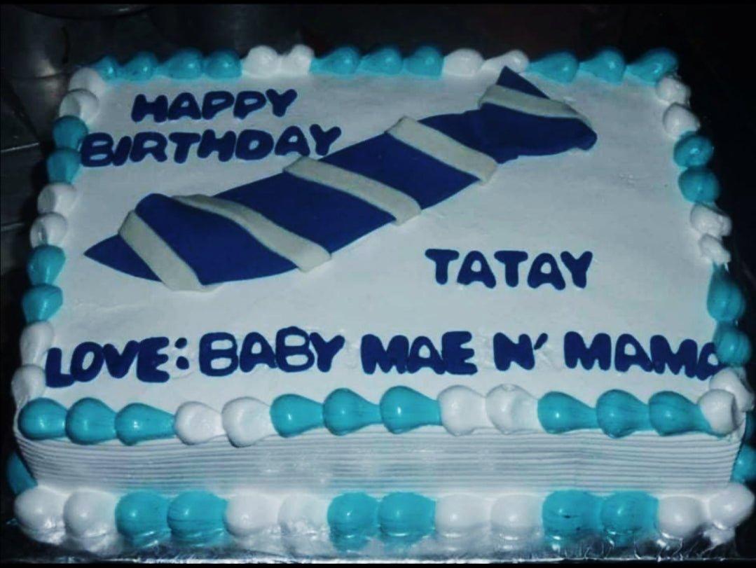Rectangle white and blue birthday cake for Tatay with a blue and white striped tie design and piped icing borders.