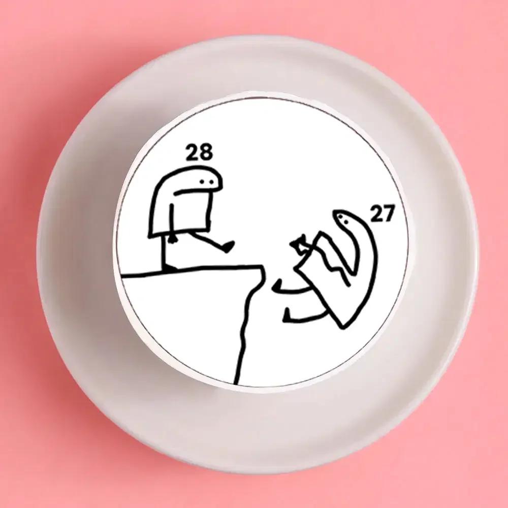 White bento cake with a minimalist black and white Flork of Cows meme design showing one character kicking another off a cliff.