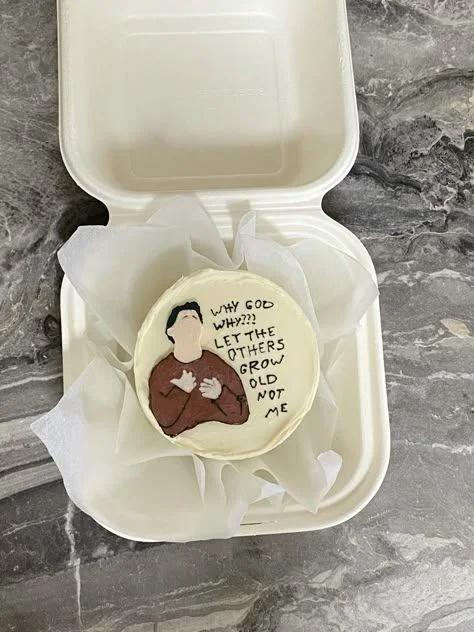 Bento cake with a hand-painted icing doodle of Joey from Friends and a funny birthday message.