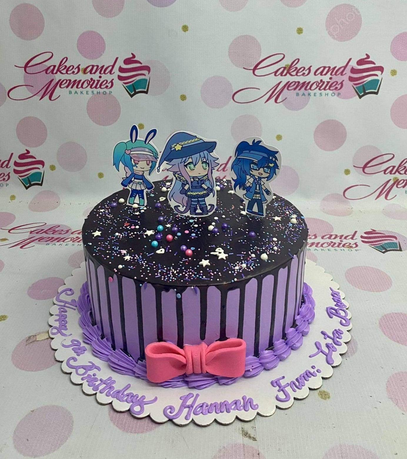 Purple Gacha Life themed birthday cake with black chocolate drip, colorful sprinkles, and character printouts.