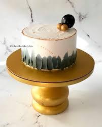 Cake 1 Tier - black, gold, green theme with black sphere and dark green/gray brush strokes on cake side