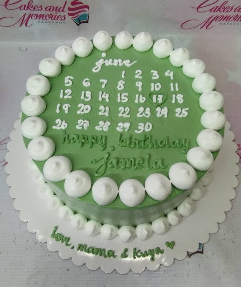 Green minimalist calendar cake with white icing dollops and personalized birthday message for Jamela.