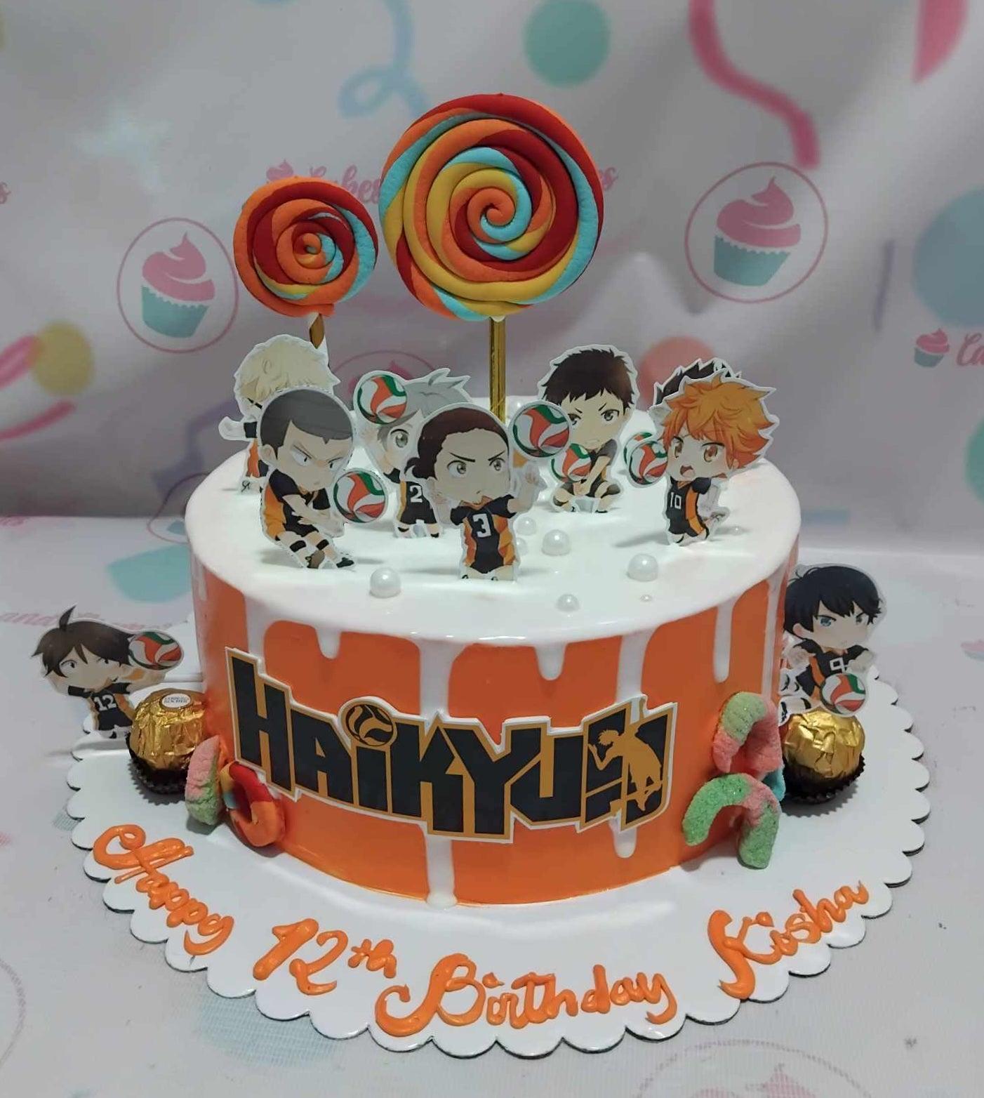 Orange Haikyuu anime themed birthday cake with character printouts, lollipops, and white chocolate drip.