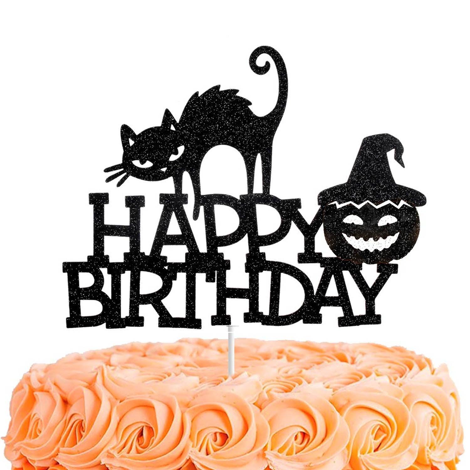 Peach colored soft icing cake with a black glittery Halloween themed Happy Birthday topper featuring a cat and a pumpkin.