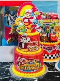 Two-tier red and yellow Jollibee themed birthday cake with character printouts and Primo message.