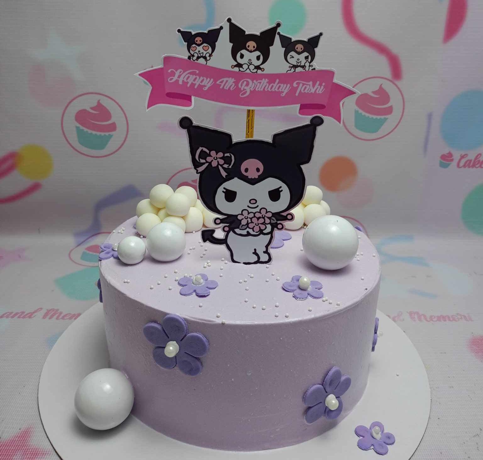 Purple Kuromi birthday cake with purple fondant flowers, white spheres, and a pink birthday banner topper.