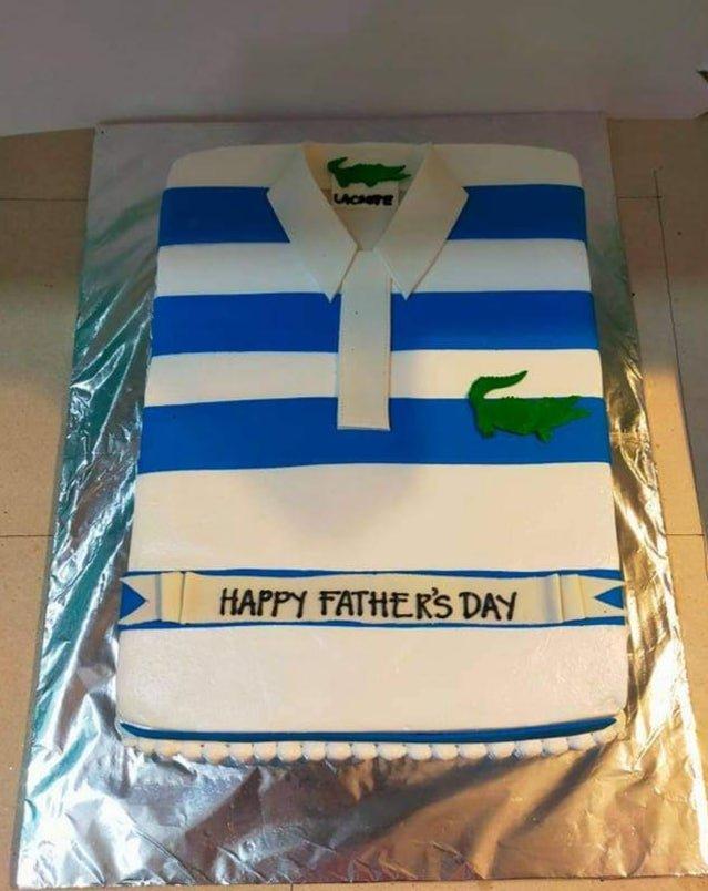 Blue and white striped Lacoste polo shirt cake for Father's Day with green crocodile logos and a Happy Father's Day banner.
