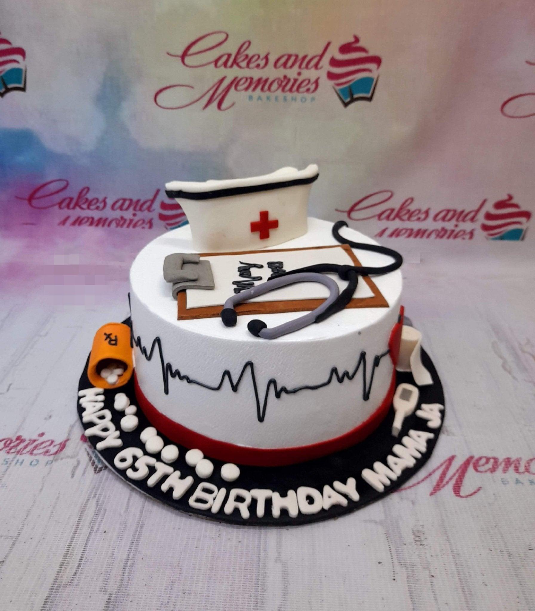 White medical themed cake with a nurse hat, stethoscope, clipboard, and EKG line for a 65th birthday.