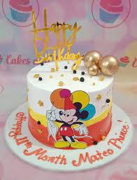 Mickey Mouse baby 1 Tier - gold, black theme with Gold 'Happy Birthday' cardstock topper and Printout of Mickey Mouse with...