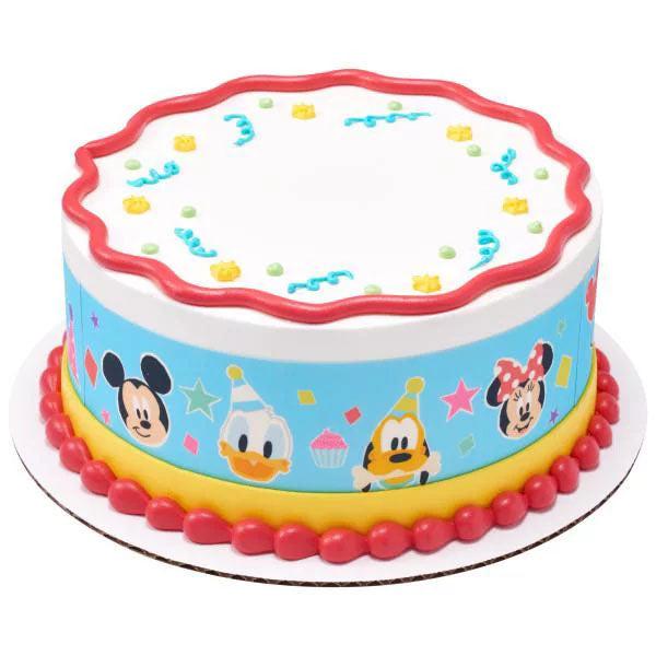 Mickey Mouse and Friends themed birthday cake with blue character wrap, yellow base, and red icing borders.