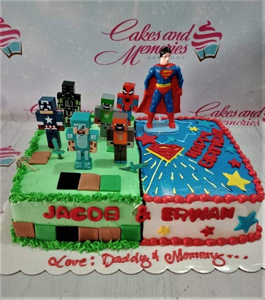 Split-themed rectangle cake featuring Minecraft and Superman designs with various character toppers and red icing borders.