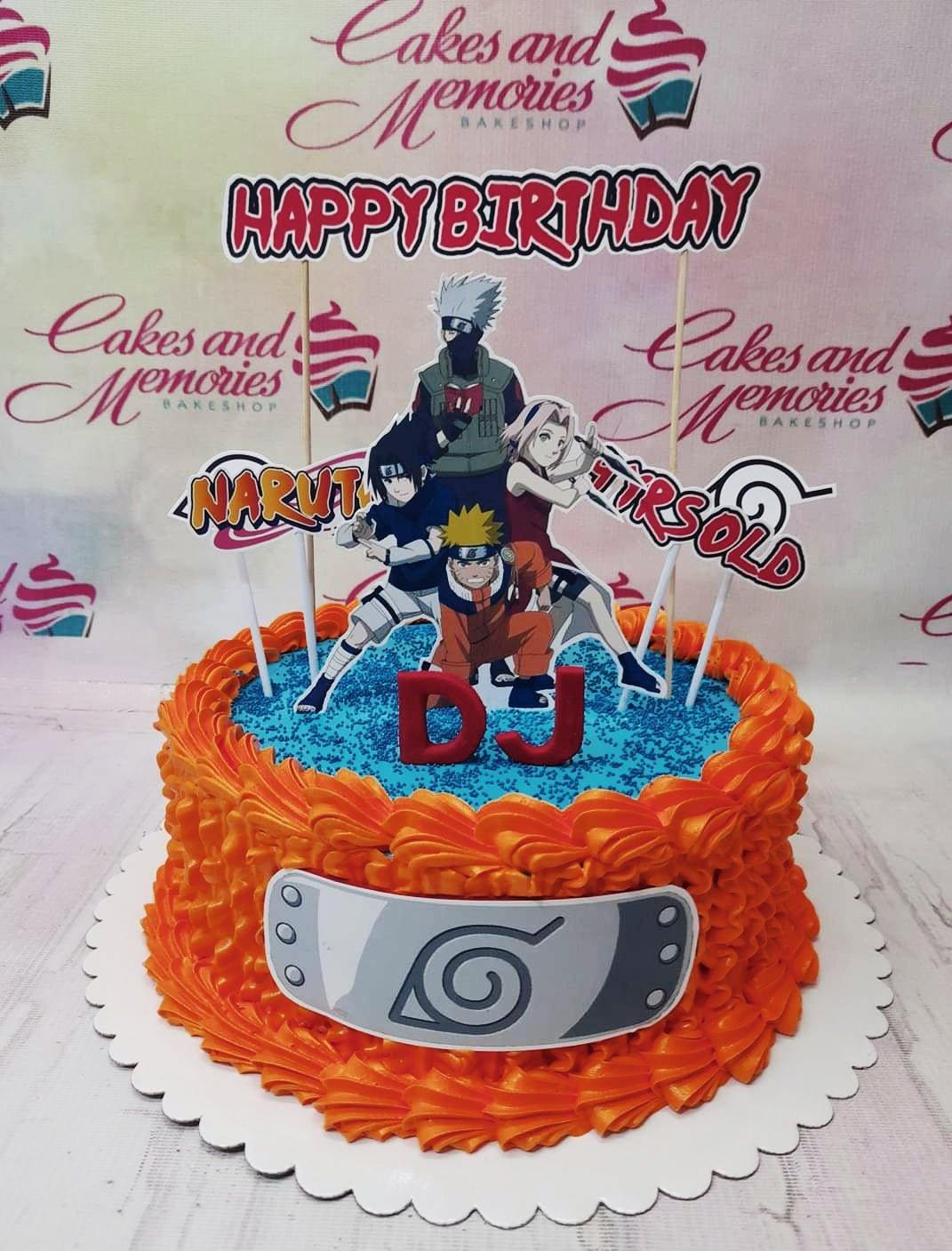 Naruto themed birthday cake with orange icing ruffles, blue sprinkles, and character printouts of Naruto, Sasuke, Sakura, and Kakashi.
