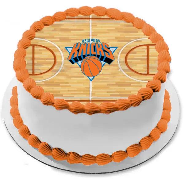 New York Knicks basketball court themed cake with orange icing borders and a printed court design on top.