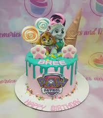 Paw Patrol birthday 1 Tier - white, brown, green theme with white Paw Patrol character and colorful sprinkles