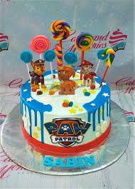 Paw Patrol 1 Tier - blue, yellow, red theme with Paw Patrol Chase Printout and edible swirl lollipop